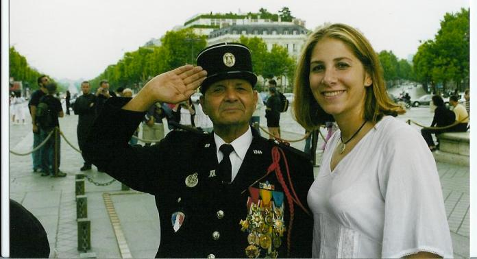 With a French veteran at the Arc de Triomphe